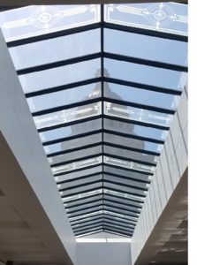 A skylight in the middle of an indoor area.